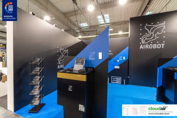 Airobot heat recovery unit with a gold band beside a brochure rack at Warsaw HVAC Expo 2024
