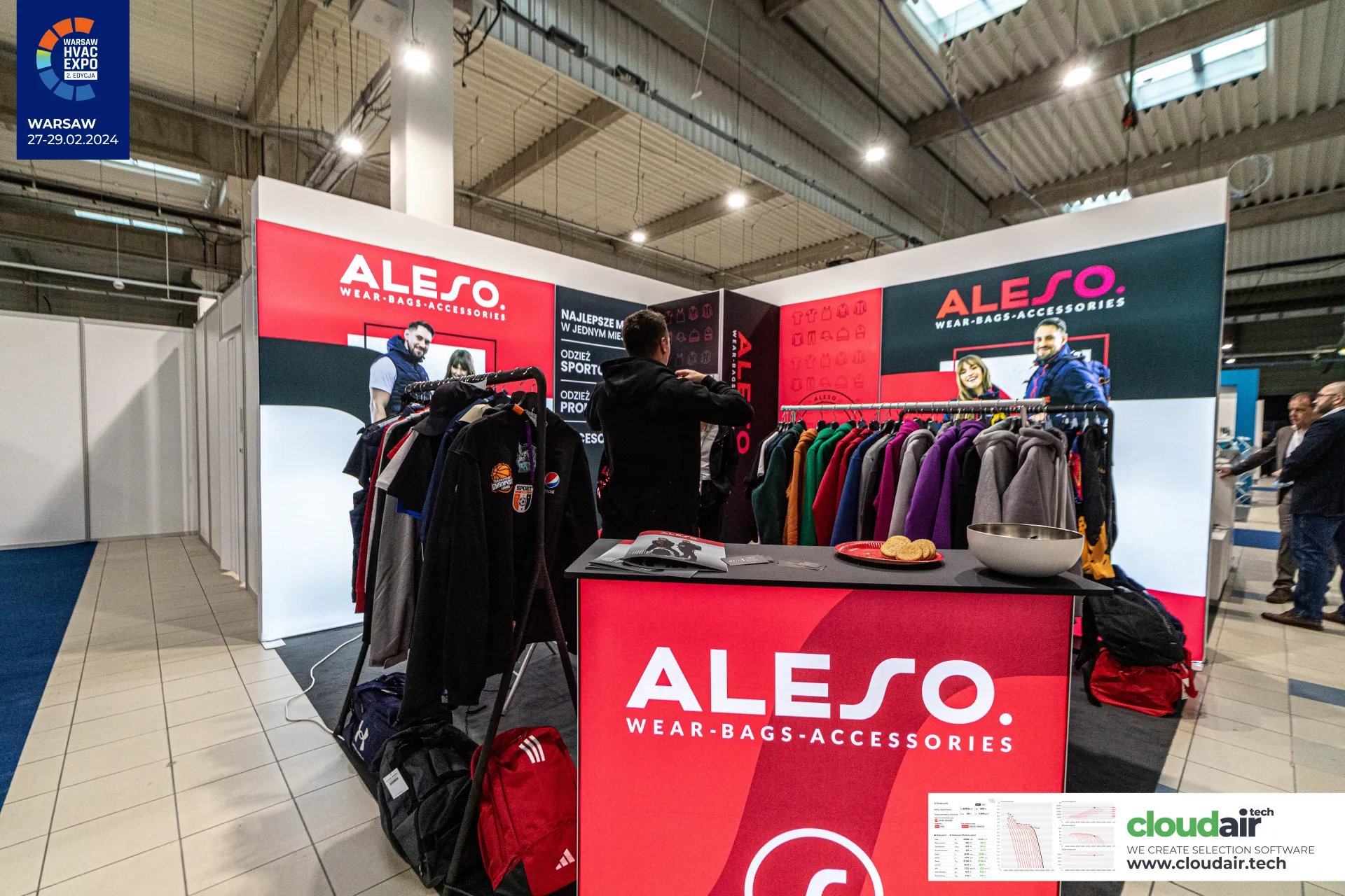 Aleso clothing stand with garment rails and branded red counter at Warsaw HVAC Expo 2024