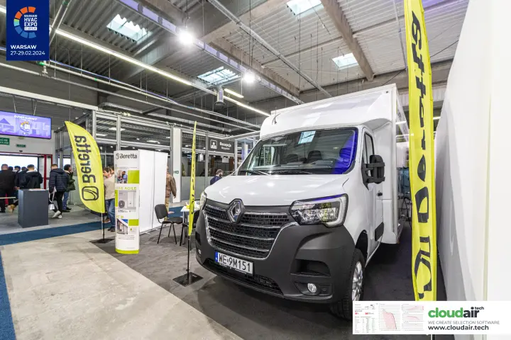 Beretta stand with a white Renault box van between yellow flags