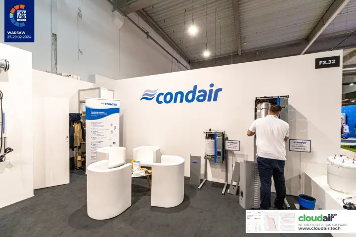 Condair EL and RS steam humidifiers with open casings beside a white lounge at Warsaw HVAC Expo 2024
