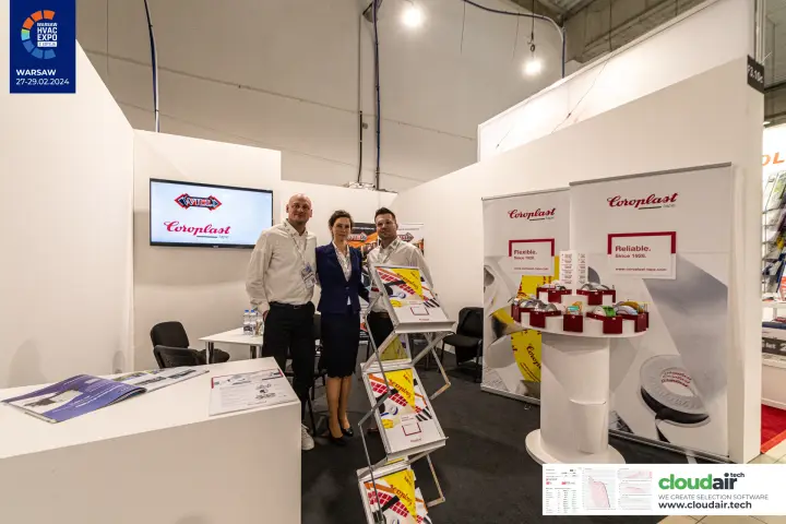 Coroplast stand team beside the Willi and Coroplast screen at Warsaw HVAC Expo 2024