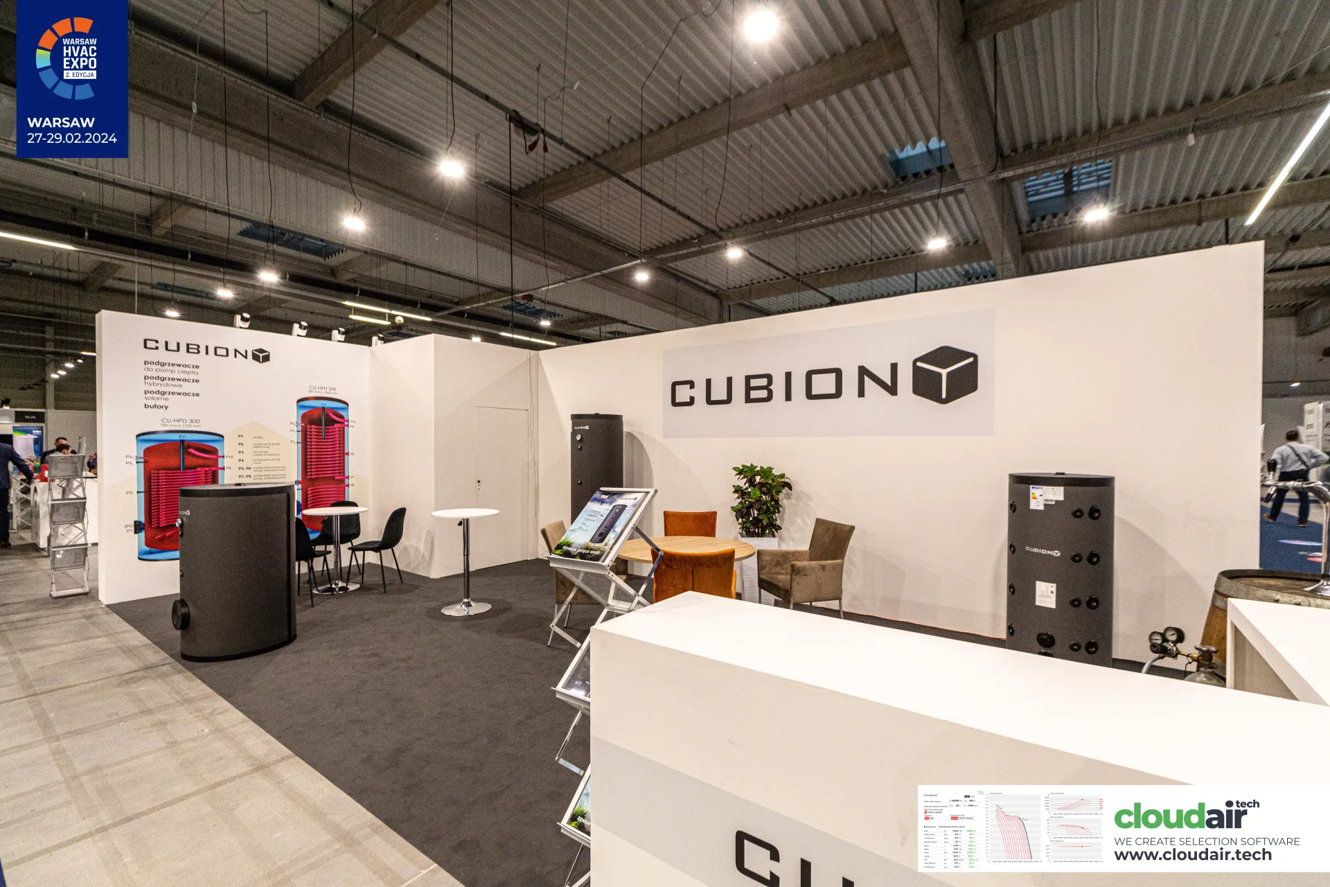 Cubion stand with hot water cylinders and buffer tanks on white walls at Warsaw HVAC Expo 2024