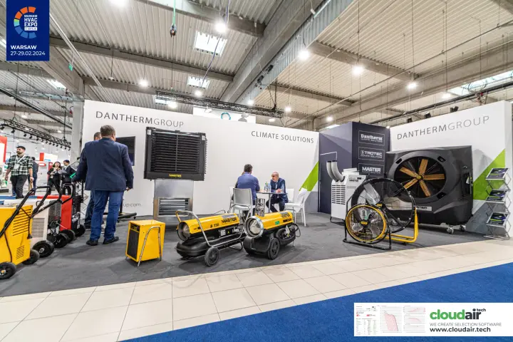 Dantherm Group stand with yellow Master heaters and drum fans at Warsaw HVAC Expo 2024