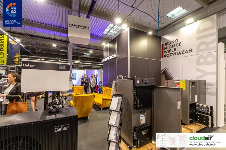 Deher units and opened Defro boilers by yellow armchairs at Warsaw HVAC Expo 2024