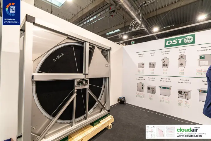 DST D-MAX desiccant rotor next to a chart of DST dehumidifiers at Warsaw HVAC Expo 2024