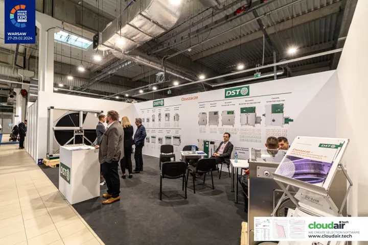 DST stand with a wall chart of Recusorb and Consorb dehumidifiers at Warsaw HVAC Expo 2024