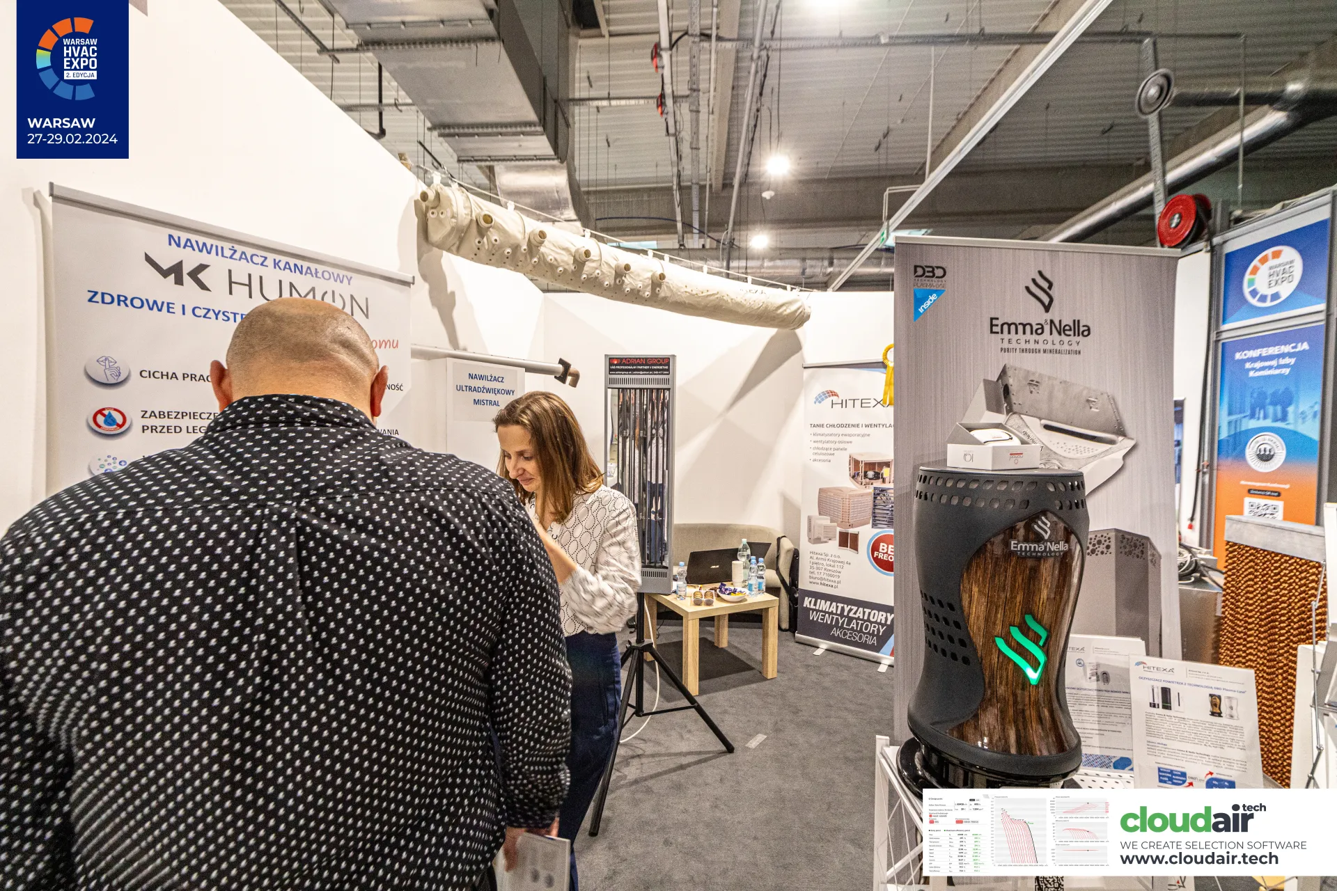 Emma'Nella unit with green-lit logo beside humidifier and Hitexa roll-ups at Warsaw HVAC Expo 2024