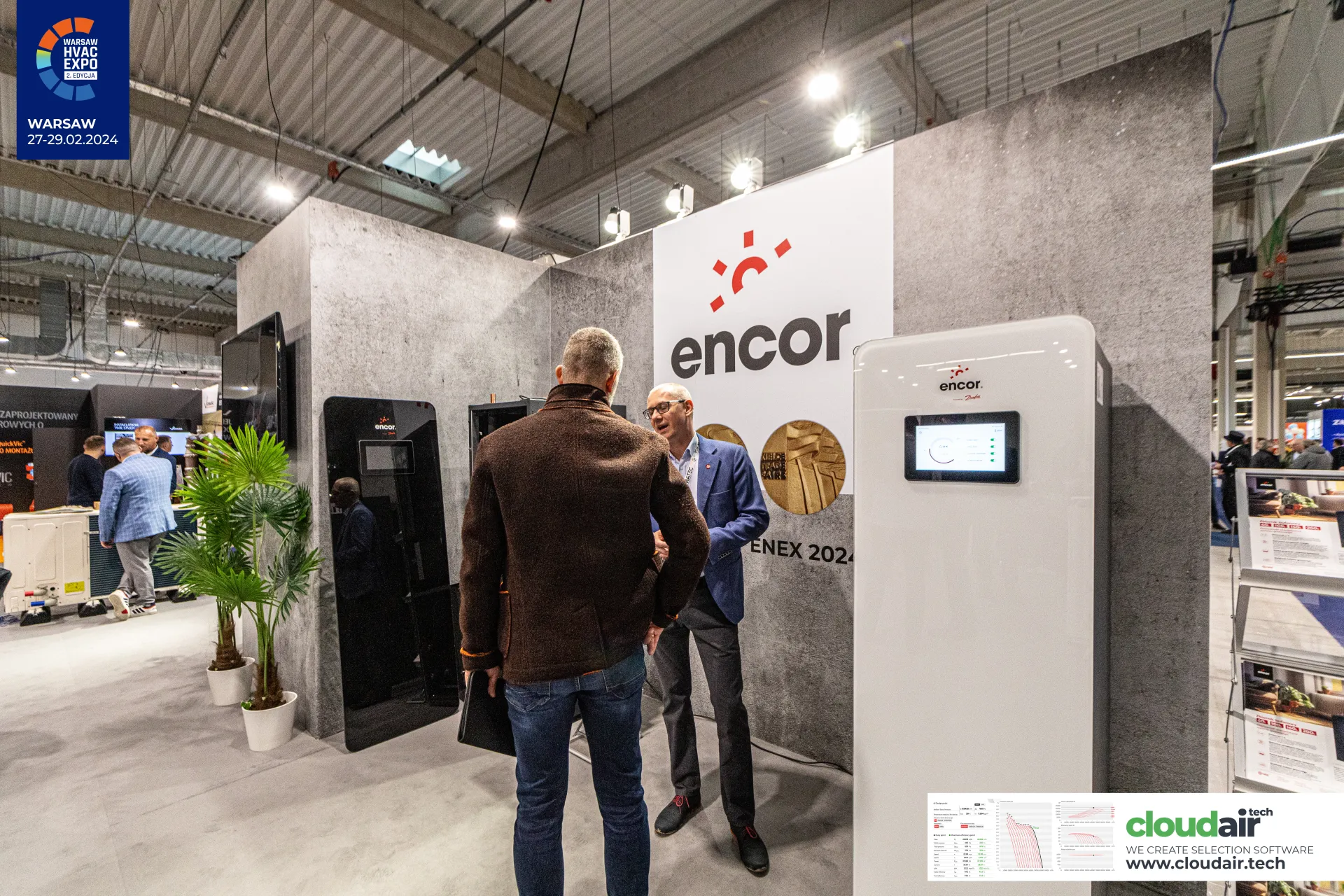 Encor stand with glass-fronted heat pump cabinets and ENEX 2024 medals at Warsaw HVAC Expo 2024