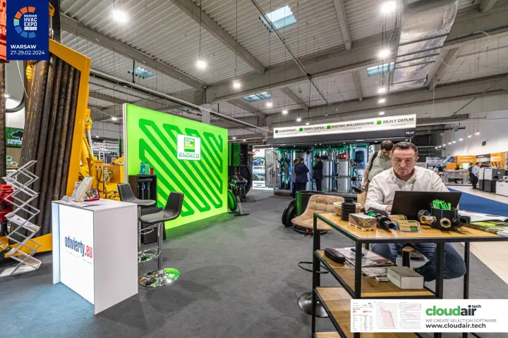 Engeco geothermal stand with drilling rig and pipe fittings on the table