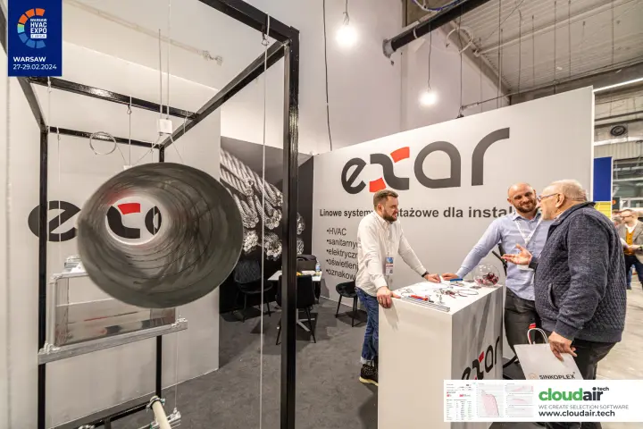 Exar demo frame with a spiral duct hung on steel cables