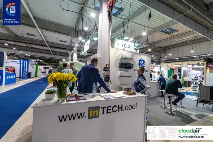 inTECH reception counter with daffodils and GE Appliances wall units at Warsaw HVAC Expo 2024