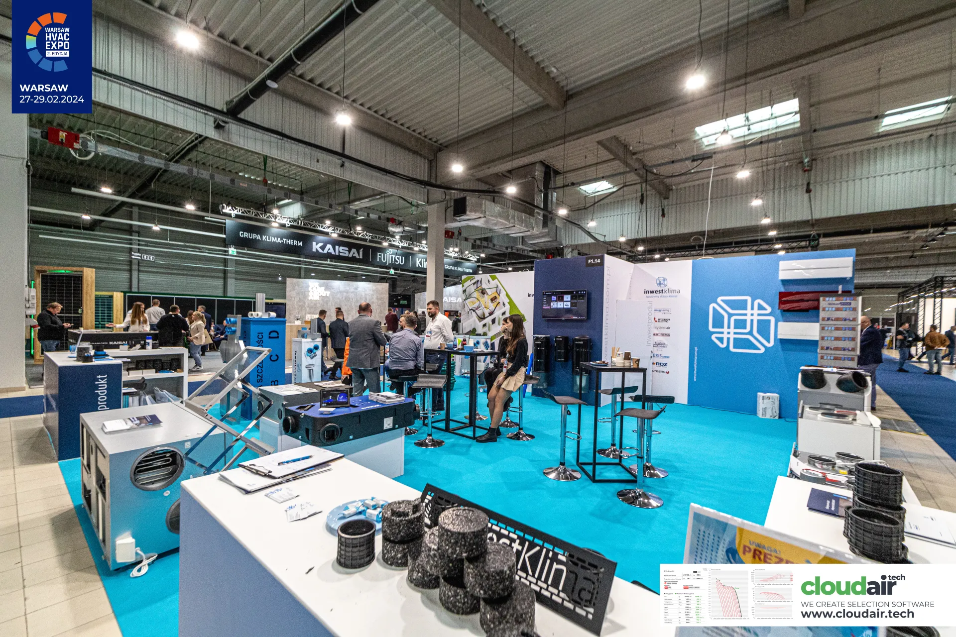 Inwest Klima wall with split units and high tables on a turquoise floor at Warsaw HVAC Expo 2024
