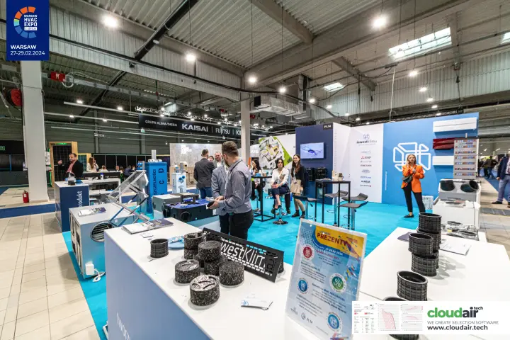 Inwestklima stand F1.14 with recuperators, duct parts and a 'Prezenty' promotion at Warsaw HVAC Expo 2024