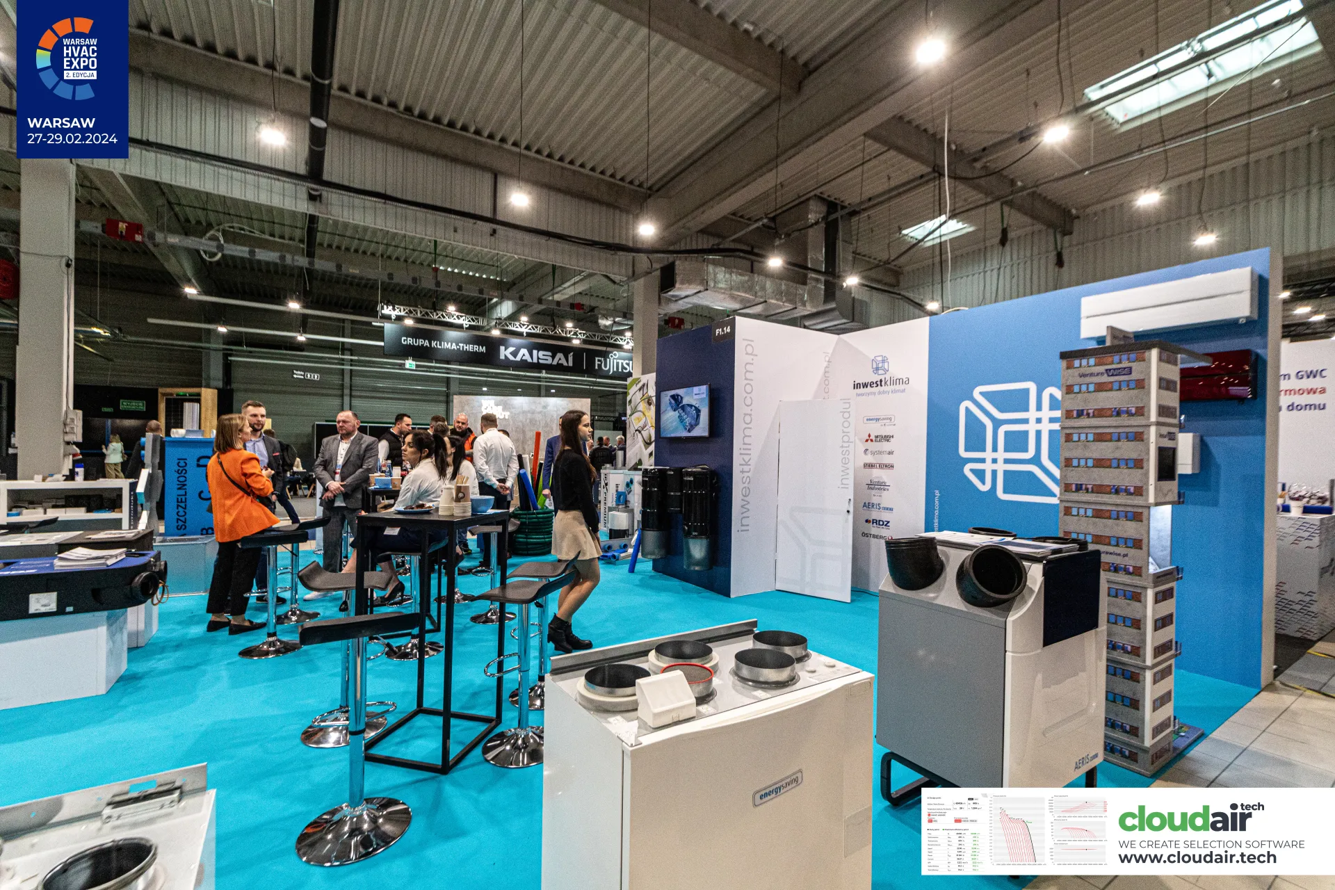 Inwestklima stand with heat recovery units and a multi-storey building model at Warsaw HVAC Expo 2024