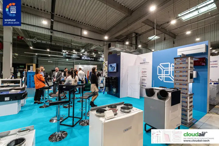 Inwestklima stand with heat recovery units and a multi-storey building model at Warsaw HVAC Expo 2024