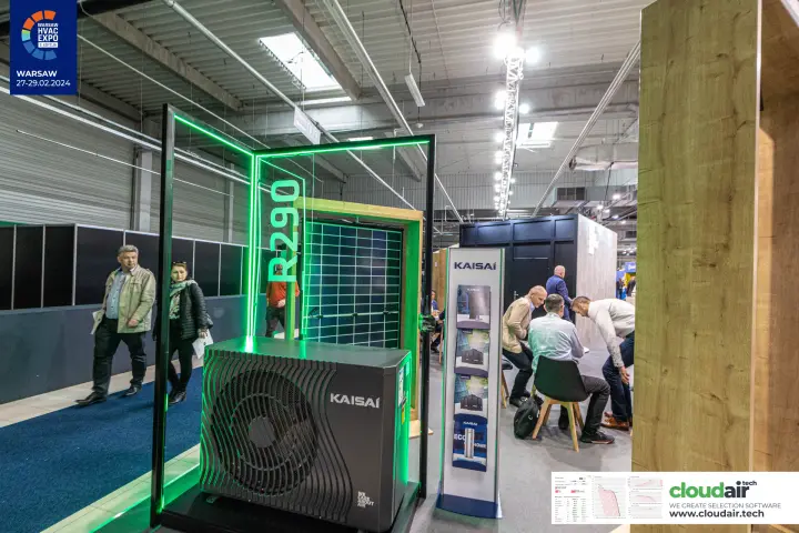 Kaisai R290 outdoor heat pump in a green-lit frame beside a solar panel