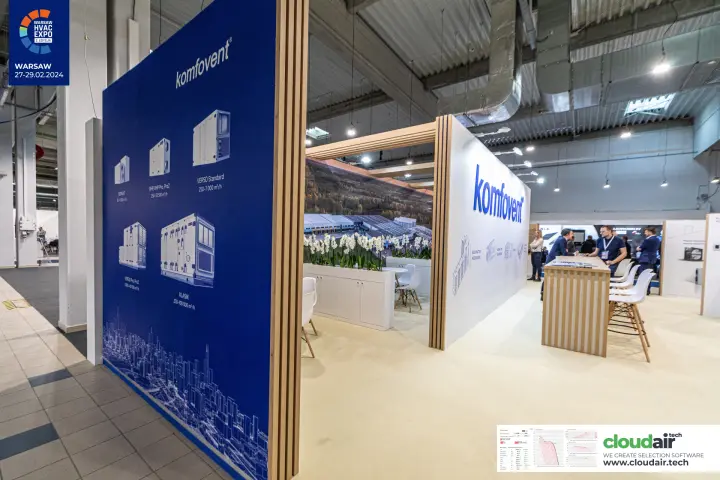 Komfovent stand with product range wall and wooden bar counter