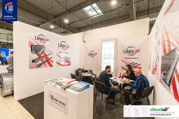 LinkUp posters of flange profiles and corners beside a meeting table at Warsaw HVAC Expo 2024