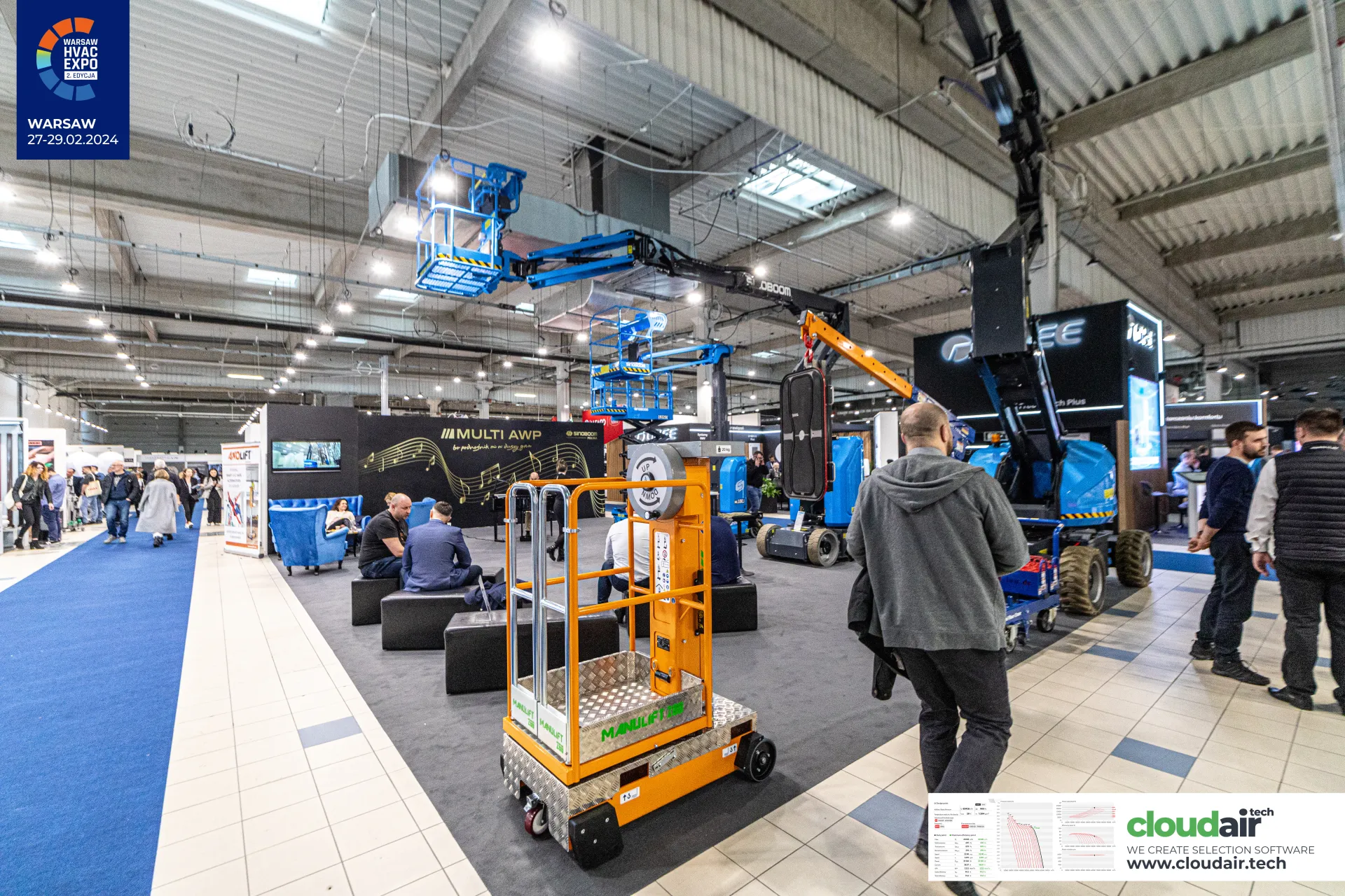 Manulift mast lift and Sinoboom booms in front of the Multi AWP lounge at Warsaw HVAC Expo 2024
