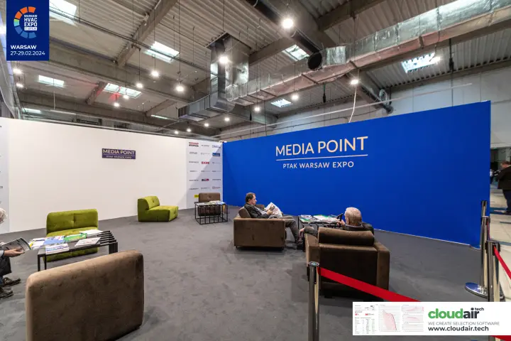 Media Point lounge of Ptak Warsaw Expo with sofas and trade press