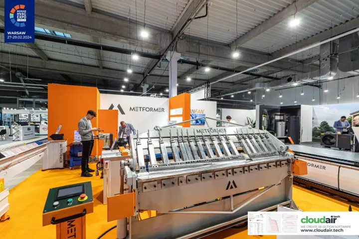 Metformer sheet-metal folding machine with orange control pedestal at Warsaw HVAC Expo 2024