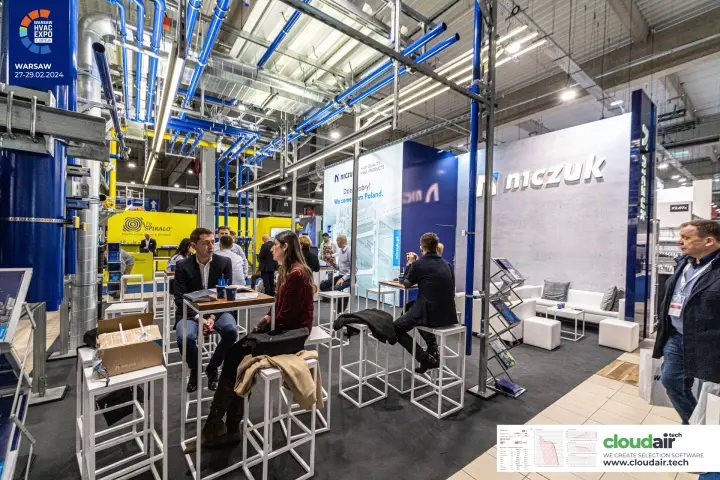 Niczuk stand with blue pipes hung on galvanised mounting frames at Warsaw HVAC Expo 2024