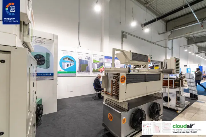 PPUCh Tarczyn air cooler on a twin-fan unit in front of product posters