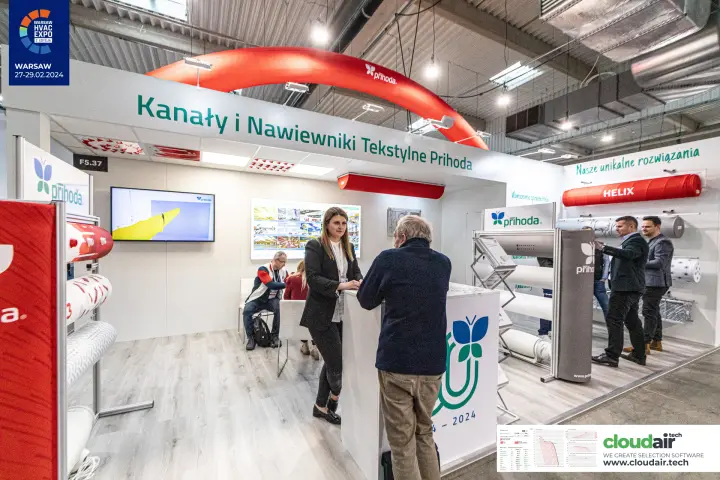 Prihoda textile duct stand with red fabric arch and rear meeting table at Warsaw HVAC Expo 2024