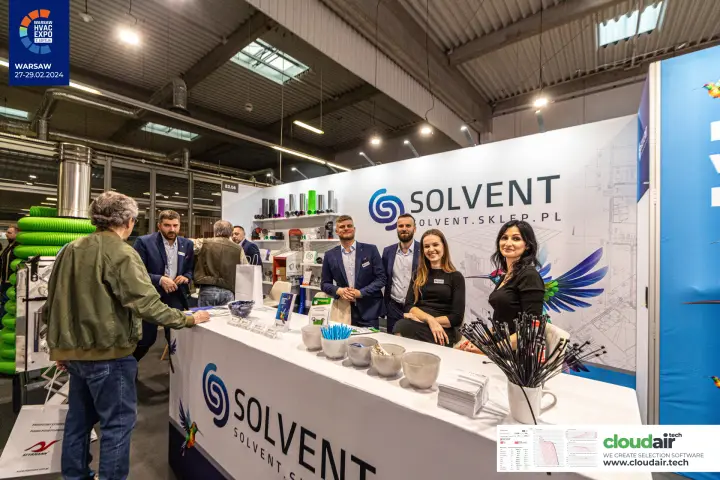 Solvent team at the E3.06 counter with duct fittings on shelves at Warsaw HVAC Expo 2024