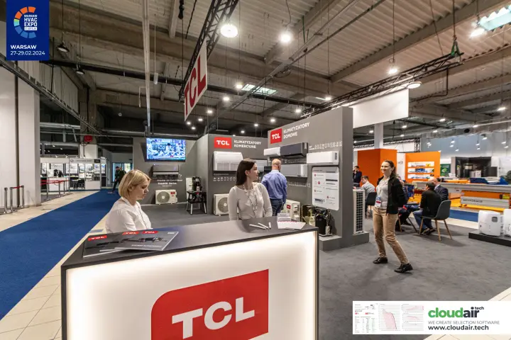 TCL illuminated reception counter in front of air conditioner displays at Warsaw HVAC Expo 2024