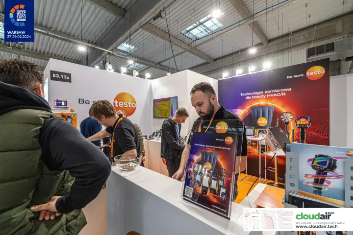 Testo stand with HVAC/R measurement posters and visitors at counter at Warsaw HVAC Expo 2024