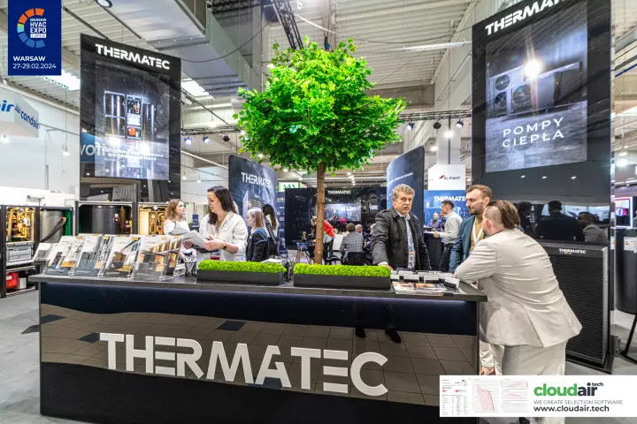 Thermatec counter beneath a 'POMPY CIEPŁA' display tower and tree at Warsaw HVAC Expo 2024