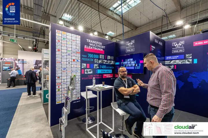 TME stand corner with supplier logos and high meeting table at Warsaw HVAC Expo 2024