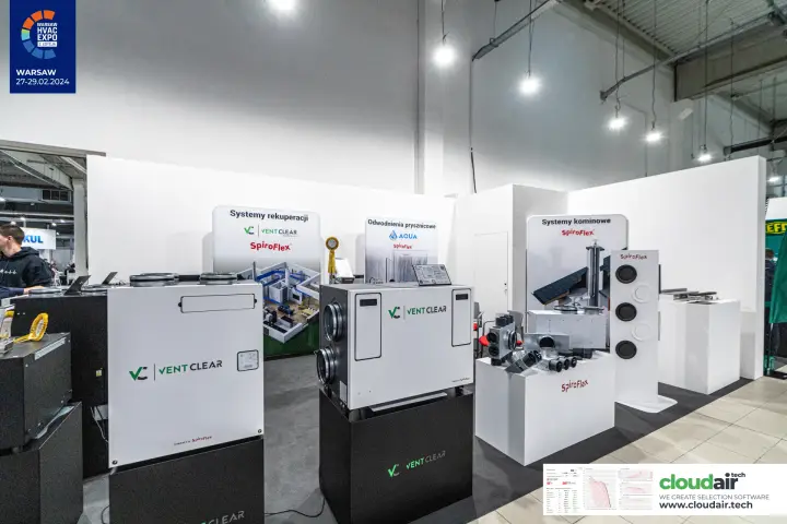Two Vent Clear heat recovery units on black plinths before SpiroFlex roll-ups at Warsaw HVAC Expo 2024