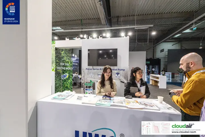 UWO reception counter with Focus Series R290 heat pump graphics at Warsaw HVAC Expo 2024