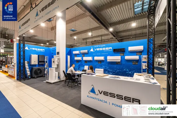 Vesser stand with a wall of split air conditioners and heat pumps at Warsaw HVAC Expo 2024
