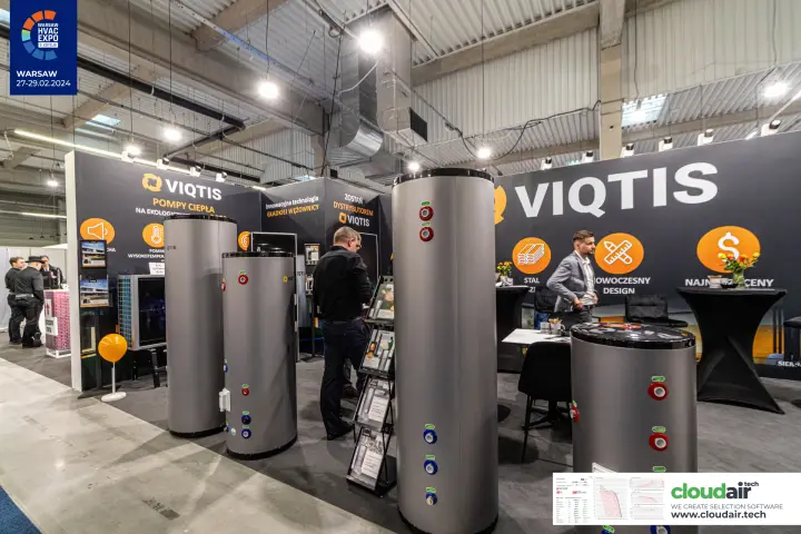 Viqtis hot water cylinders in front of heat pump and coil technology panels