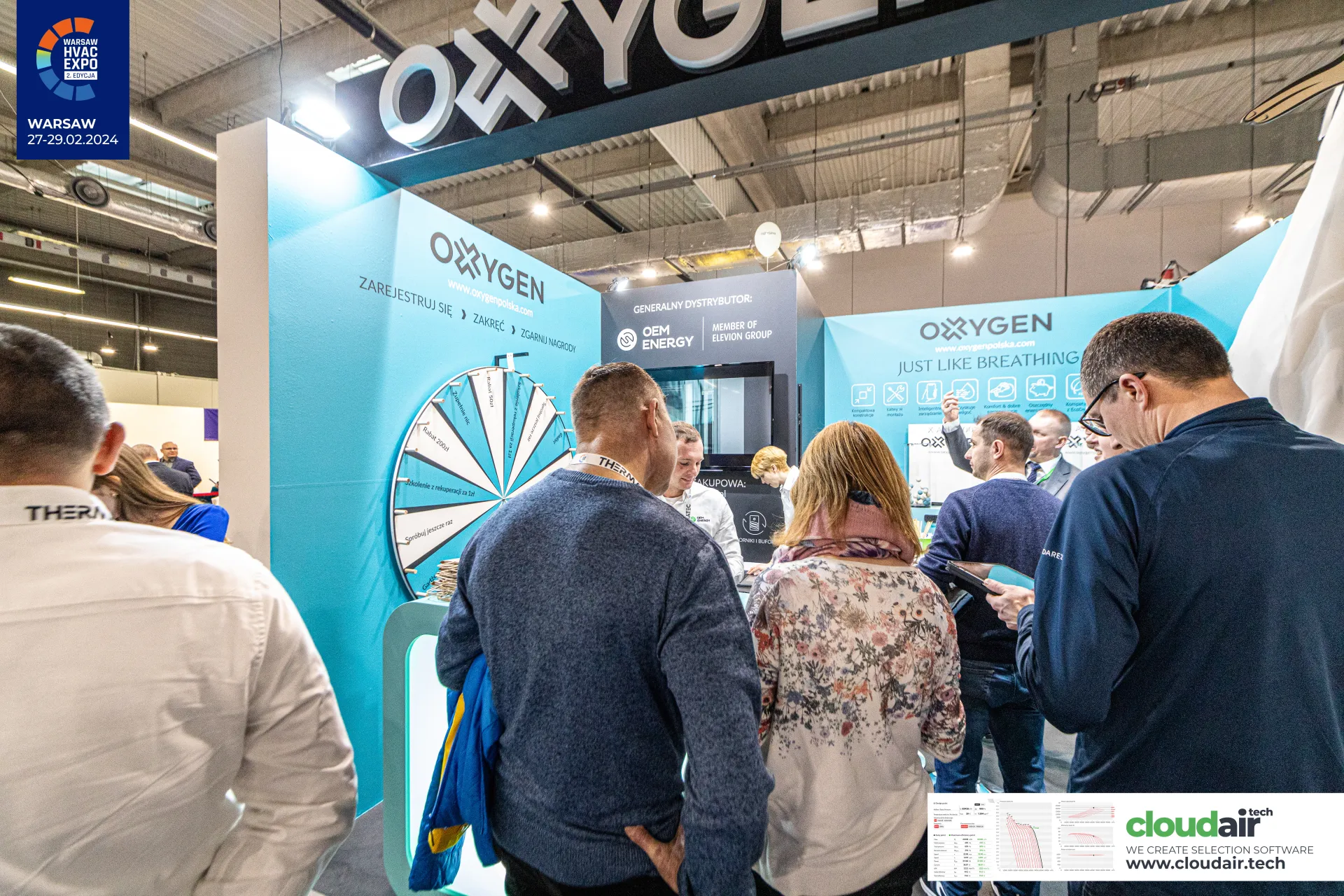 Visitors crowd the Oxygen stand around its prize wheel at Warsaw HVAC Expo 2024