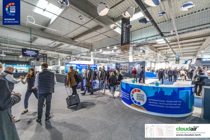 Warsaw HVAC Expo entrance counter with Thermatec banner and display wall at Warsaw HVAC Expo 2024