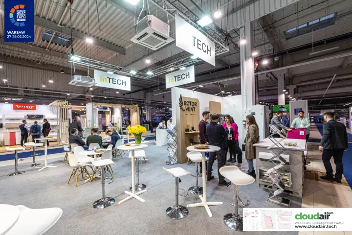 Wide view of the inTECH stand with suspended signs and cassette units at Warsaw HVAC Expo 2024