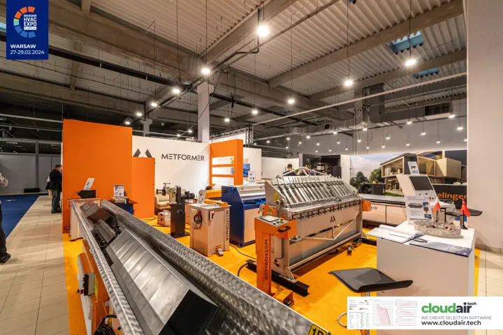 Wide view of Metformer stand with roll former, shear and folder at Warsaw HVAC Expo 2024