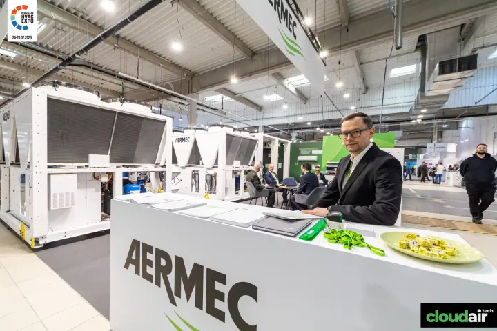 Aermec reception counter with documentation in front of air-cooled chillers at Warsaw HVAC Expo 2026
