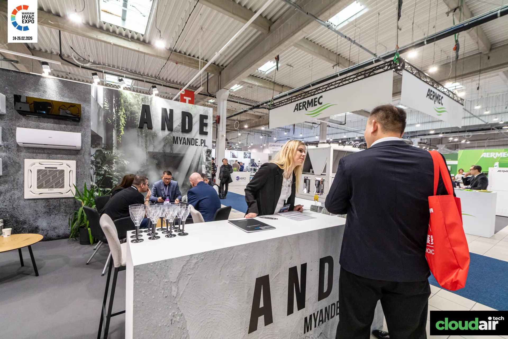 Ande reception counter with split and cassette air conditioners on the wall at Warsaw HVAC Expo 2026