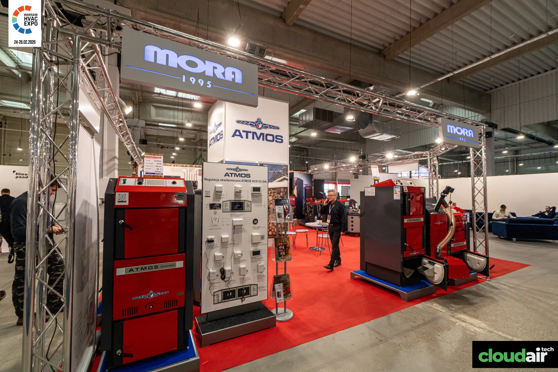 Atmos boilers and ACD 03 control board under the Mora 1995 truss frame at Warsaw HVAC Expo 2026