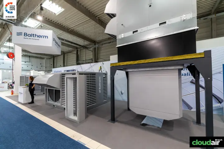 Baltherm unit raised on a steel roof-curb frame beside a louvred unit