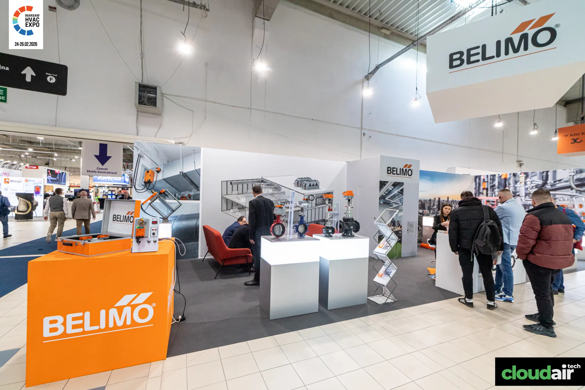 Belimo stand with valve and actuator displays on lit plinths at Warsaw HVAC Expo 2026