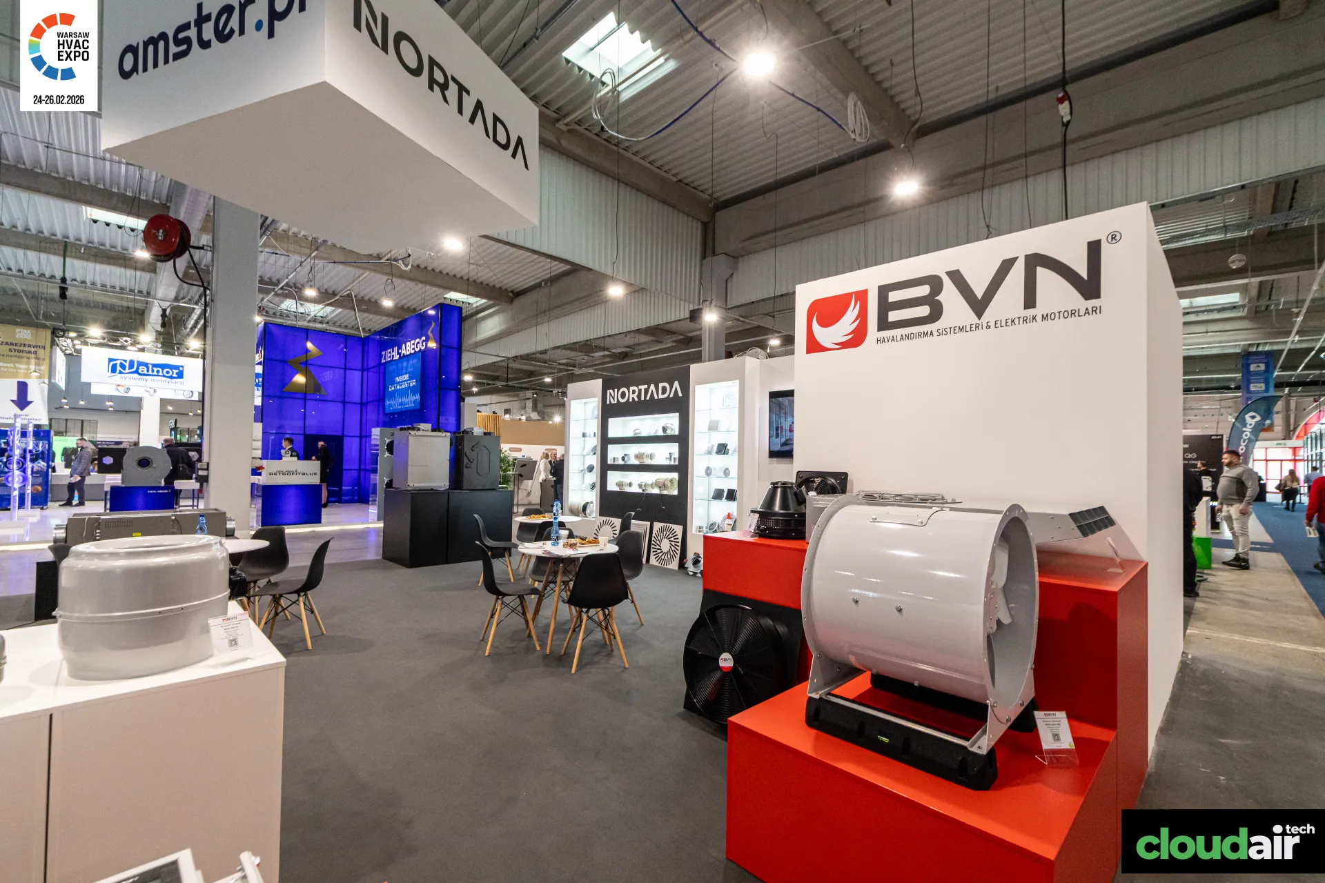 BVN axial and roof fans on red plinths beside the Nortada stand at Warsaw HVAC Expo 2026