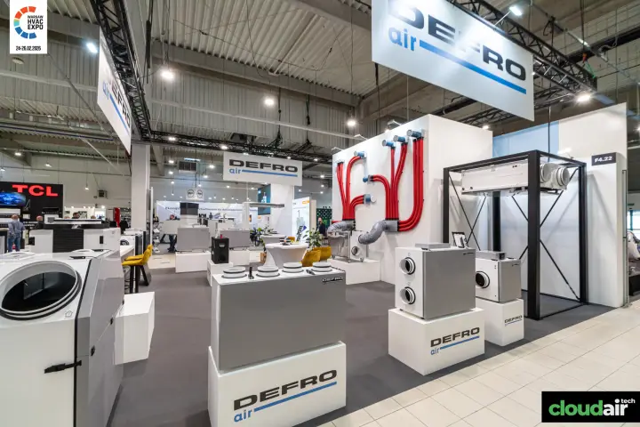Defro Air stand with heat recovery units and red air distribution ducts