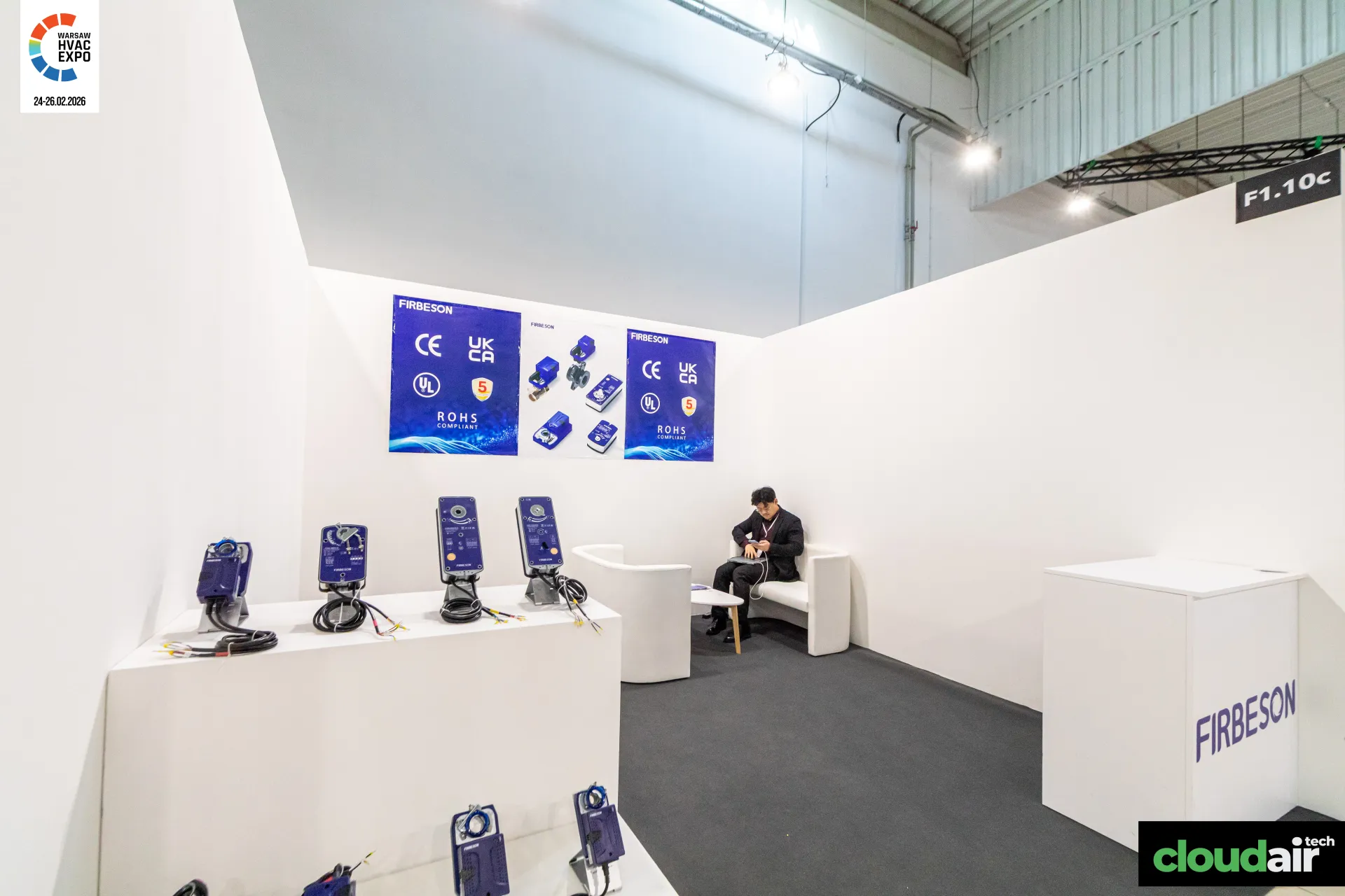 Firbeson stand F1.10c with blue actuators on white plinths at Warsaw HVAC Expo 2026