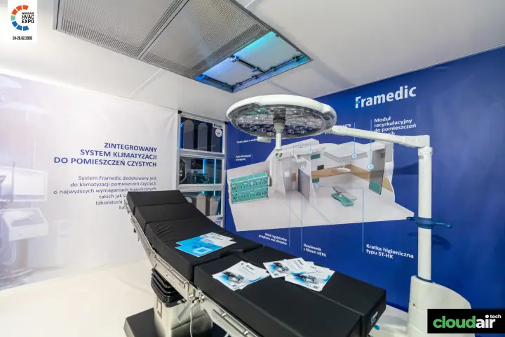 Framedic clean-room demo with operating table and HEPA ceiling diffuser at Warsaw HVAC Expo 2026